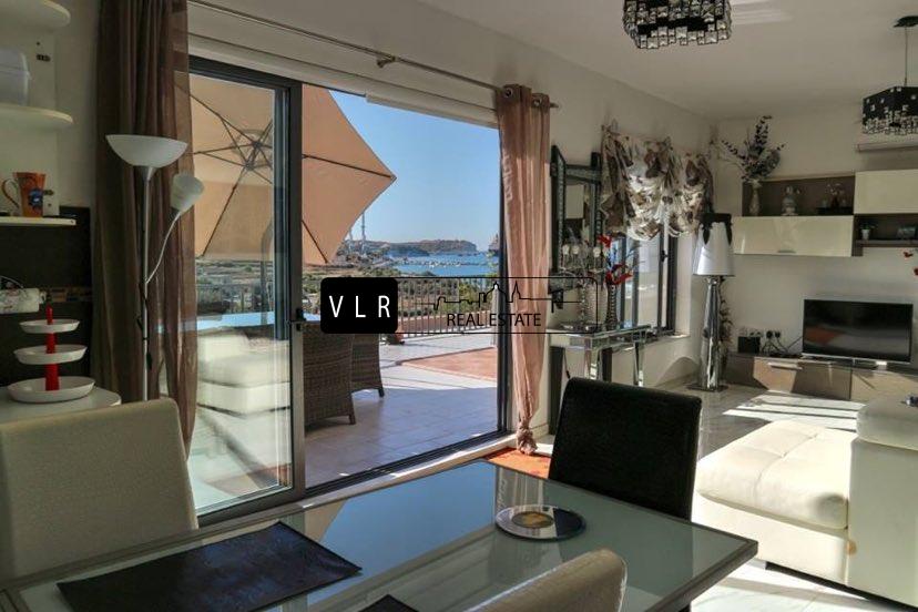 A Four-bedroom fully furnished penthouse with side sea views and ODZ views. Marsaxlokk